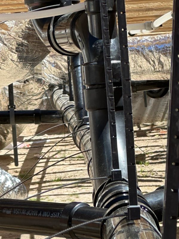 New drain assembly under a house